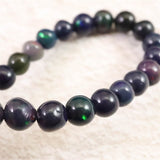 ブラックプレシャスオパール 5.5mm玉ブレスレット 5.2g (ID:84290)