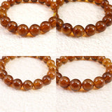 天然琥珀 ミャンマー産 レッドブルーアンバー  10.5mm玉ブレスレット 12.1g (ID:86301)