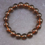 天然琥珀 ミャンマー産 レッドブルーアンバー  10.5mm玉ブレスレット 12.1g (ID:86301)
