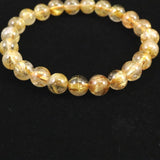 ゴールドタイチンルチルクォーツ AAA 8mm玉ブレスレット 17.3g (ID:91649)