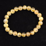 ゴールドタイチンルチルクォーツ AAA 8mm玉ブレスレット 17.3g (ID:91649)