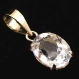 ロシア産 フェナカイト 6.7mm オーバルカット ペンダントトップ K18YG 鑑別書付 0.75ct (ID:91762)