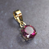 ロードライトガーネット 5mmラウンド ペンダントトップ チャーム K18YG  0.63ct (ID:95482)