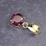 ロードライトガーネット 5mmラウンド ペンダントトップ チャーム K18YG  0.63ct (ID:95482)