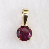 ロードライトガーネット 5mmラウンド ペンダントトップ チャーム K18YG  0.63ct (ID:95482)