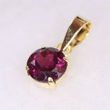 ロードライトガーネット 5mmラウンド ペンダントトップ チャーム K18YG  0.63ct (ID:95482)