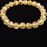 ゴールドタイチンルチルクォーツ AAAA 8mm玉ブレスレット 17.3g (ID:95617)