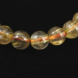 ゴールドタイチンルチルクォーツ AAAA 8mm玉ブレスレット 17.3g (ID:95617)